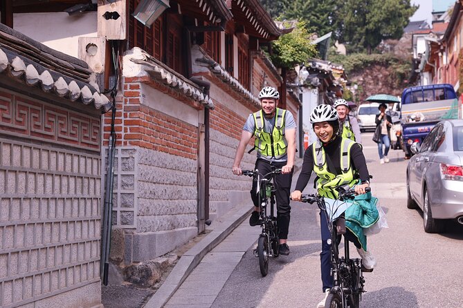 Afternoon E-bike tour and "Happy Hour" food and drinks - Cheonggyecheon to Gwanghwamun: seeing Seoul’s story from water to power