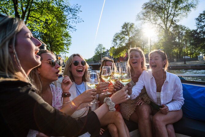 Amsterdam: Canal Booze Cruise with Unlimited Drinks Option - Passing De Wallen From the Water: What You Actually See