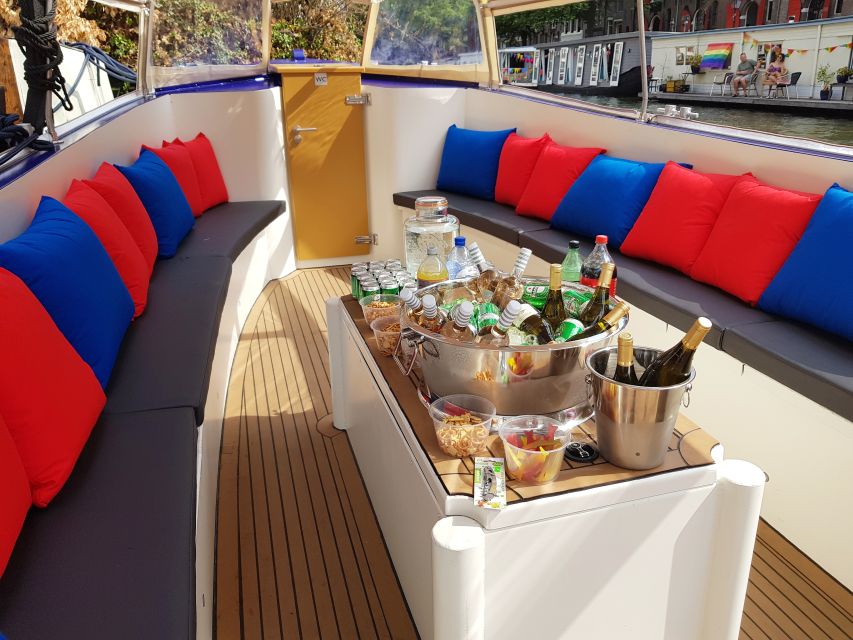 Amsterdam: Covered Canal Booze Cruise with Unlimited Drinks - Weather, blankets, and the no-music rule