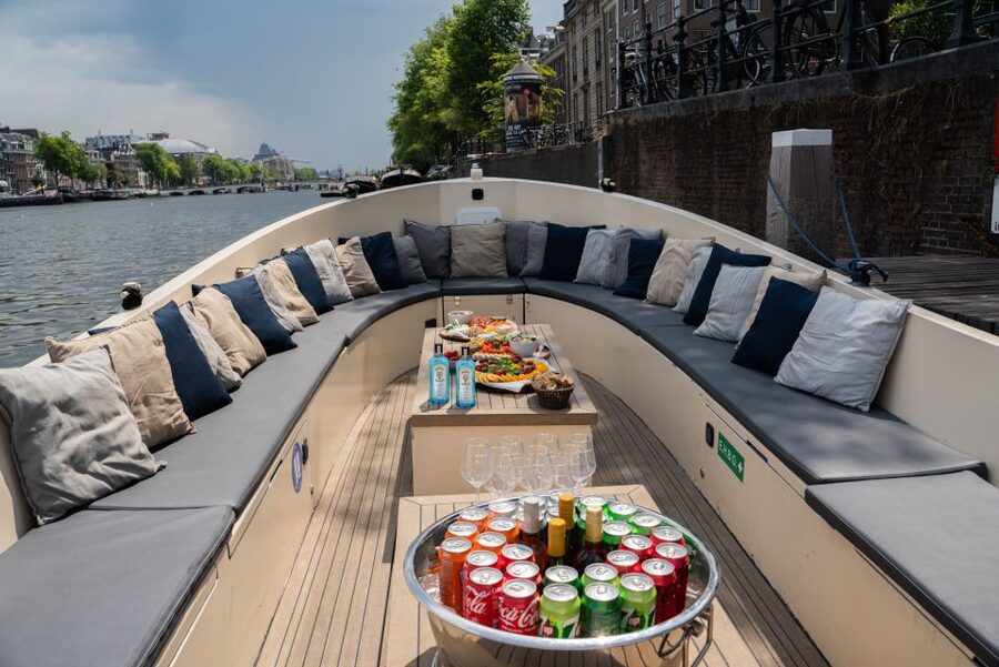 Amsterdam: Private Canal Booze Cruise with Unlimited Drinks - The open bar setup: what unlimited drinks really changes