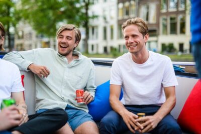 Amsterdam: Private Canal Booze Cruise with Unlimited Drinks - Stop-by-stop: Red Light District to Seven Bridges View Point