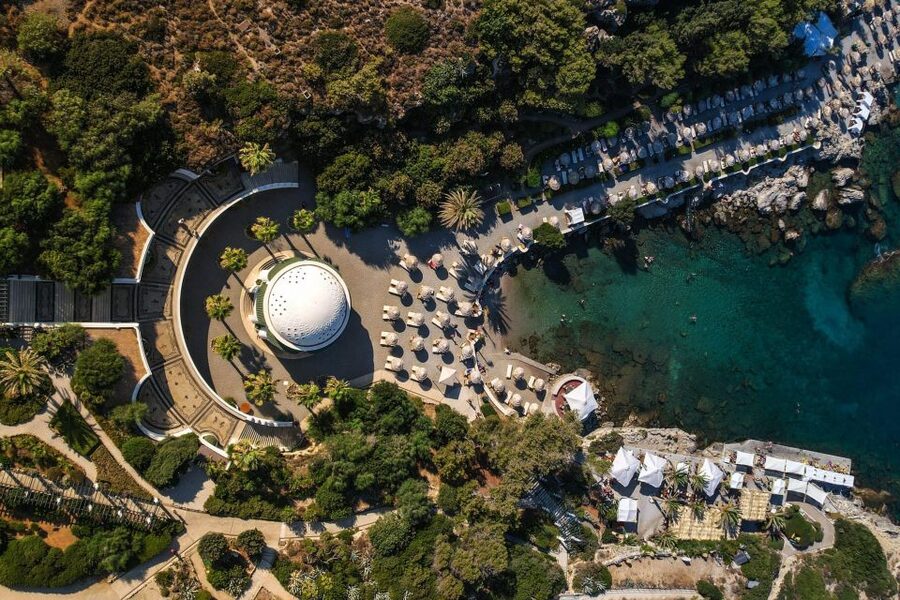 Boat Trip to Anthony Quinn's Bay (Food & Drinks Included) - The sailing boat experience: bean bags, deck space, and easy fun
