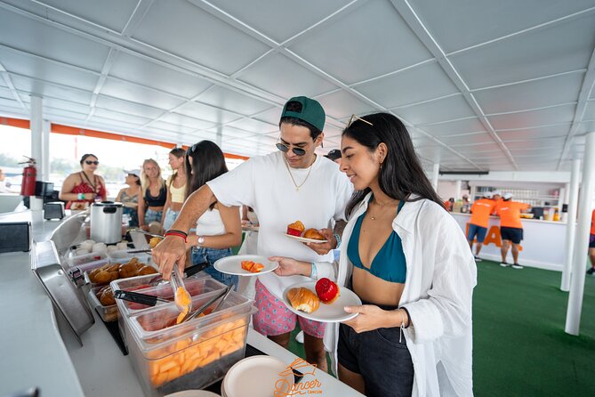 Dancer Cruise Isla Mujeres Snorkel Food and Drinks Included - Stop 1 in Cancún: check-in armbands, then coffee and pastries