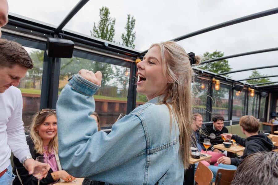 Groningen: Booze Cruise with Unlimited Drinks - On board, the vibe is built into the boat setup