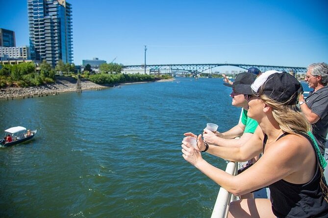 Happy Hour Sightseeing Cruise - Rose Quarter, Moda Center, and the Portland sign from the river