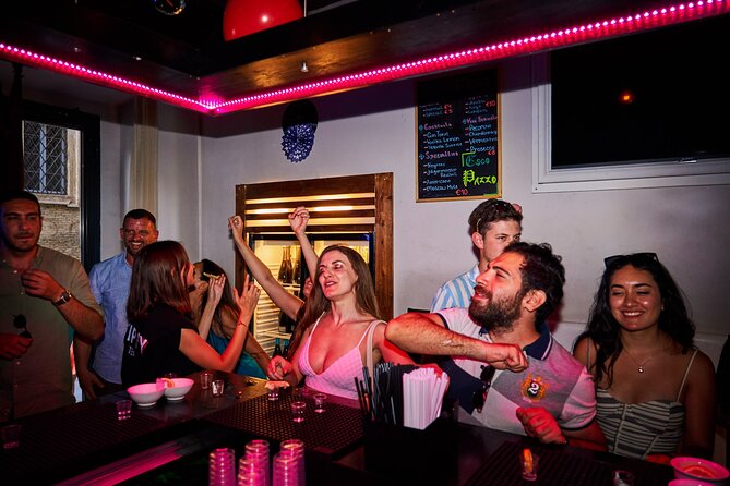 Lisbon Pub Crawl Walking Tour with Drinks Included - Starting in Largo do Carmo: First Sip, First Stories