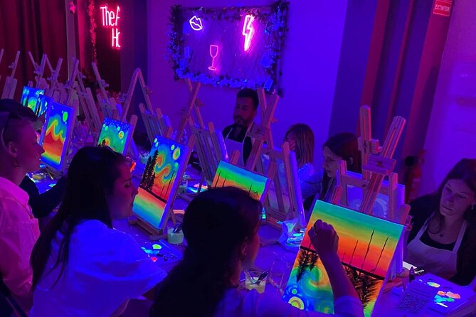 Paint a neon fluorescent picture while drinking unlimited wine - Key things that make this neon wine painting in Valencia worth it
