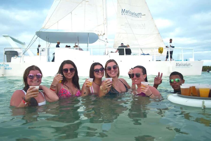 Punta Cana Happy Hour Sailing Cruise - Sunset on trampolines: the fun-photo moment that feels real