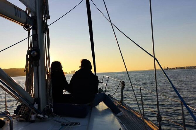 Sailboat Tour in Lisbon with drinks included | Morning and Sunset - On deck under the 25 de Abril Bridge: the start that sets the tone