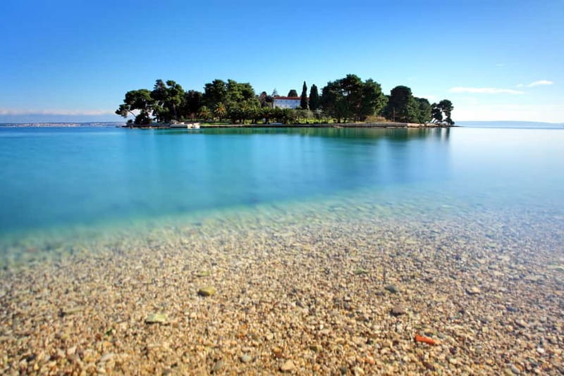 Zadar: Private SpeedBoat Tour to Islands - Drinks Included - Kostanj Bay on Ugljan: Sandy Beach Views and Real Swim Time